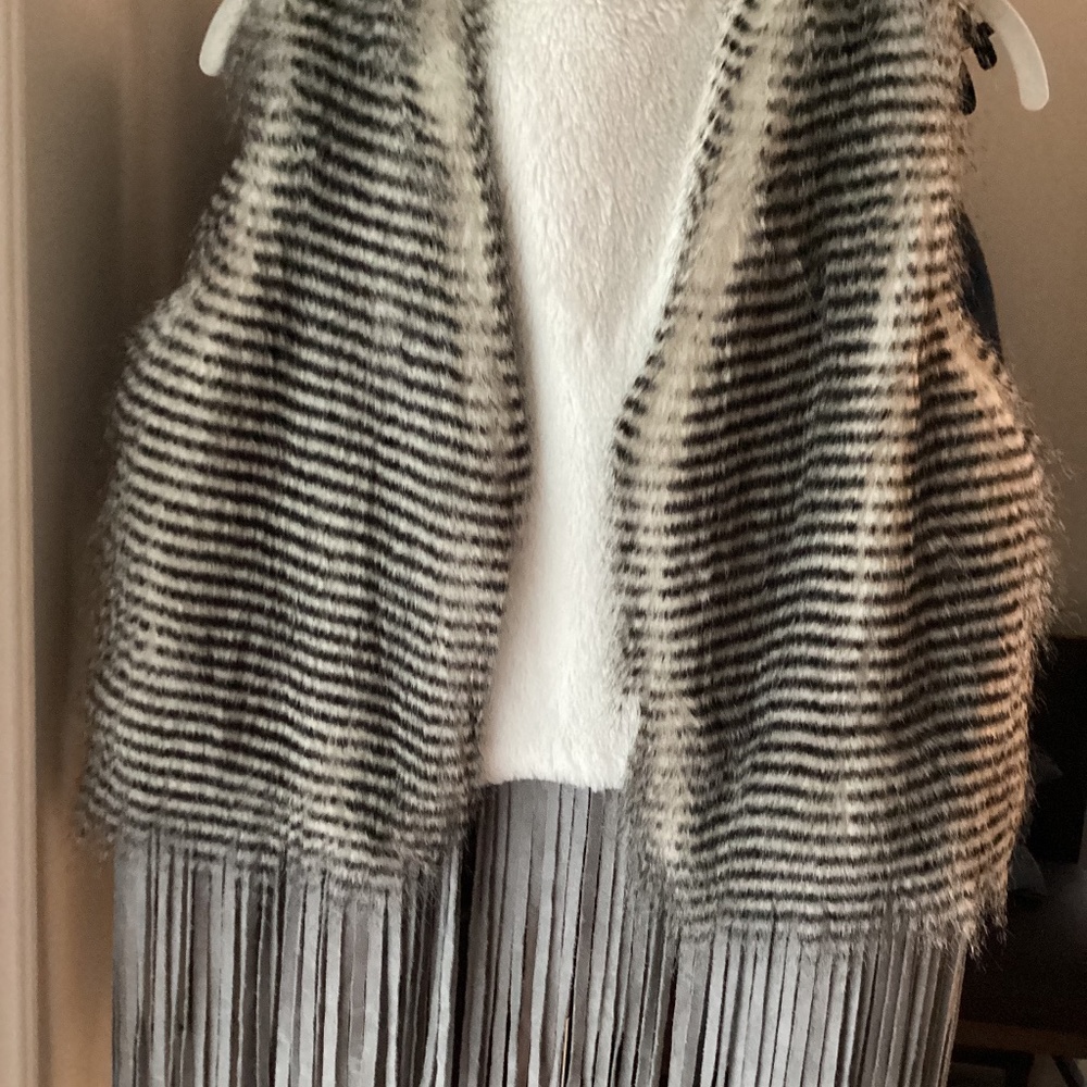 Beautiful fringe fur vest